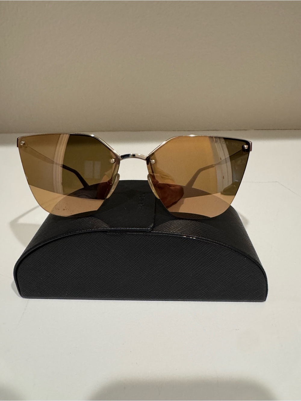Prada-Gold Trim Rimless Cat Eye Sunglasses With Case